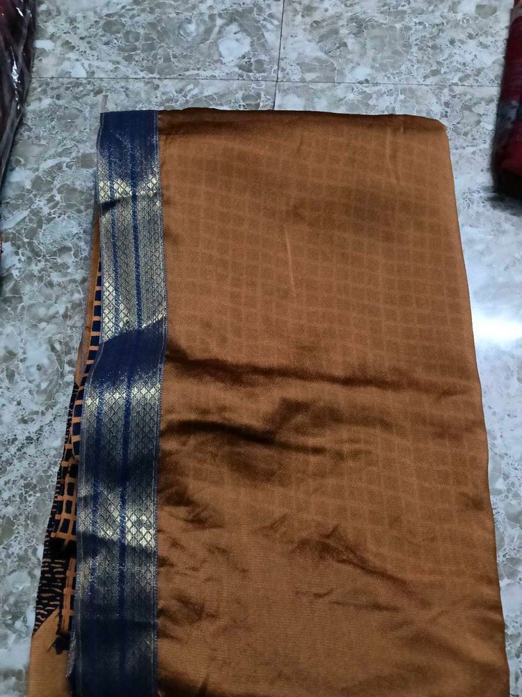 Elegant Brown Saree with Blue Border