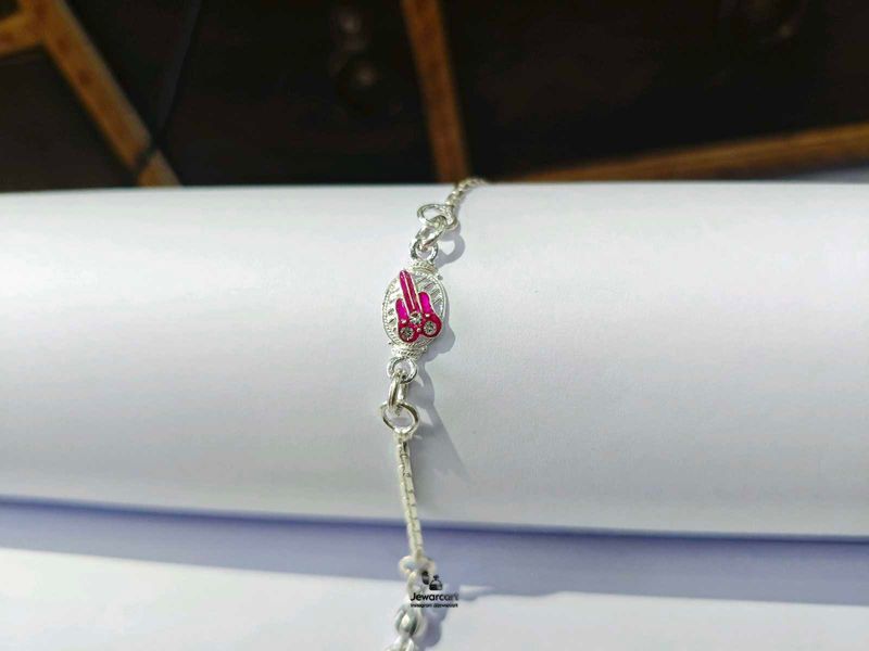 Pure Silver Rakhi with Pink Charm
