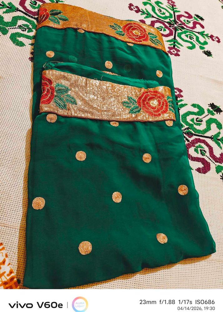 Elegant Emerald Green Saree with Gold Border