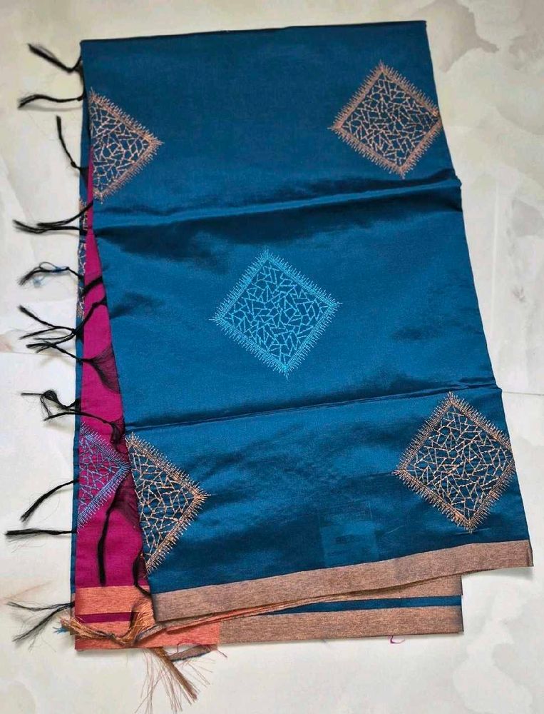 Elegant Teal Saree with Diamond Motifs