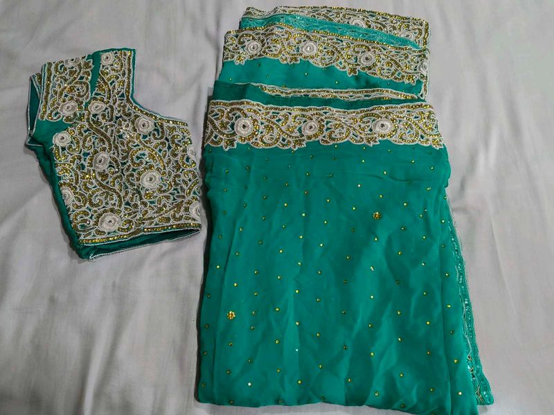 Elegant Teal Embroidered Saree...