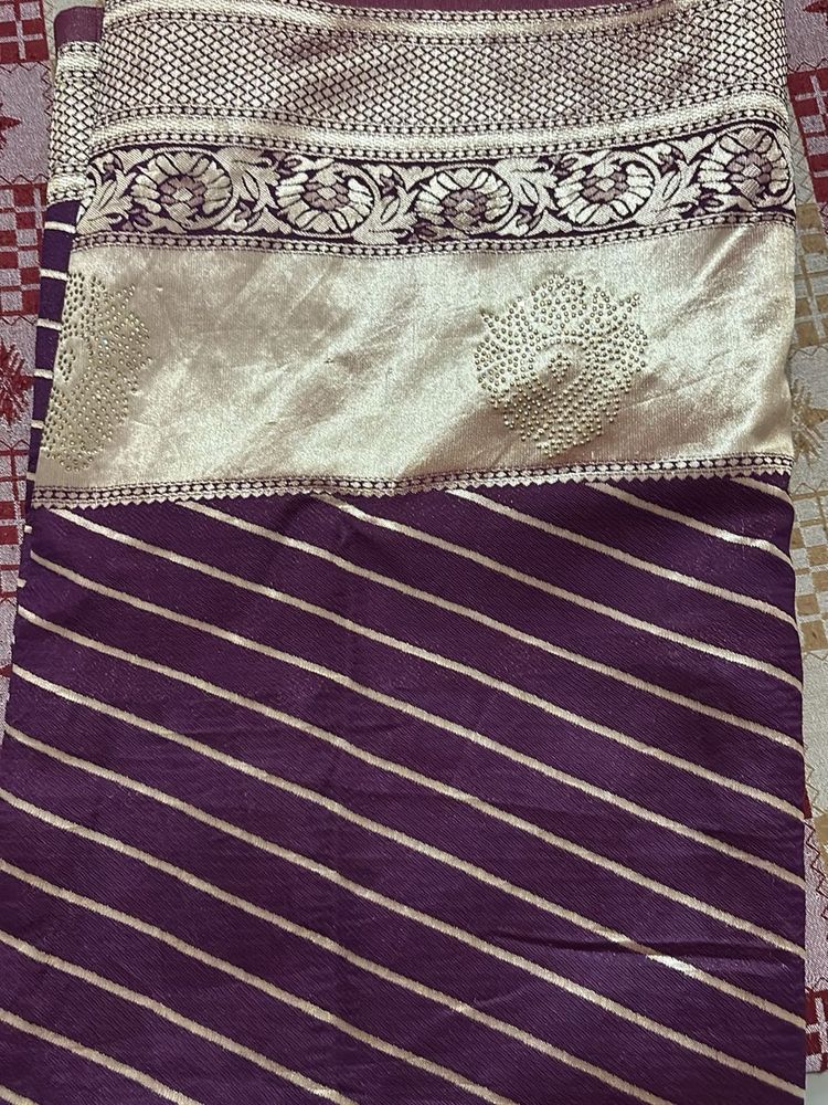 Elegant Purple Saree with Gold Stripes