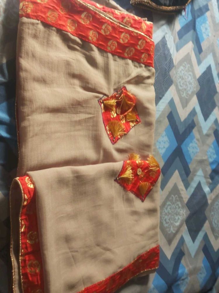 Elegant Beige Saree with Red Border