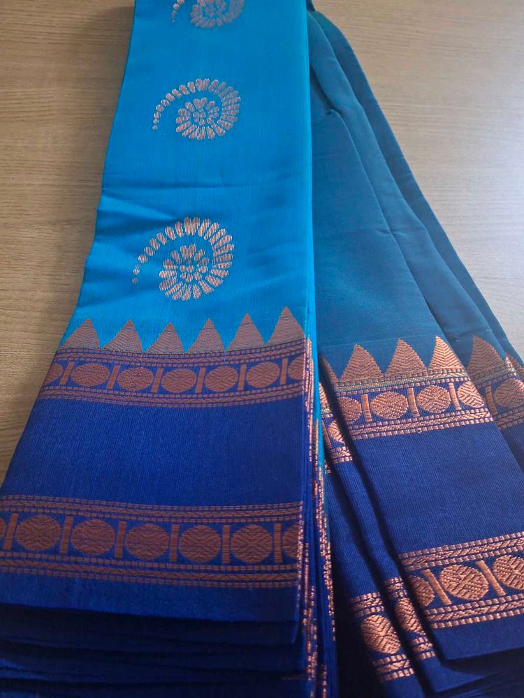 Blue Saree with Golden and Copper Motifs