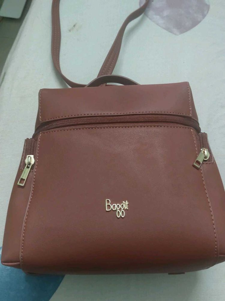 Baggit Backpack with sling.