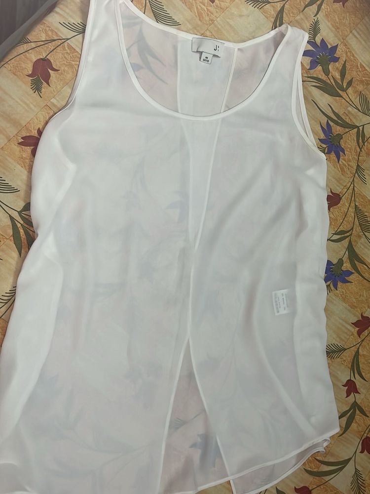 PRICE DROP @ 149 **************White Sleeveless To