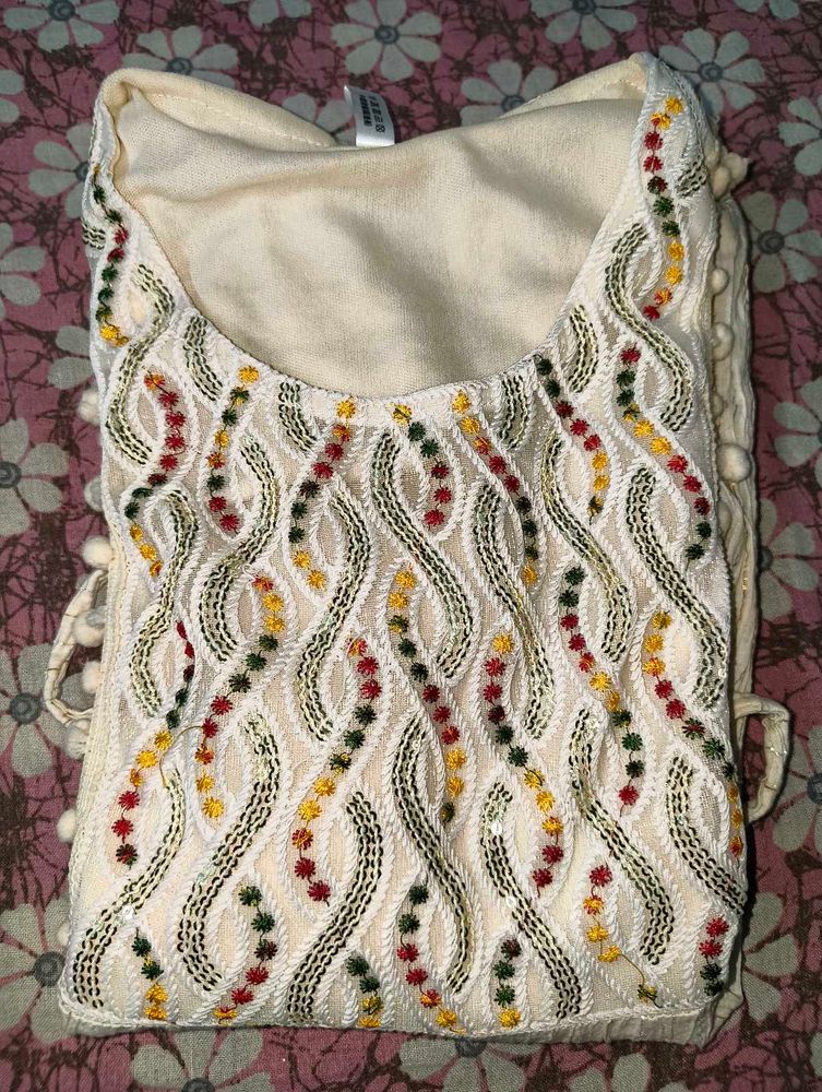 Embroidered Cream Kurta with Colorful Details