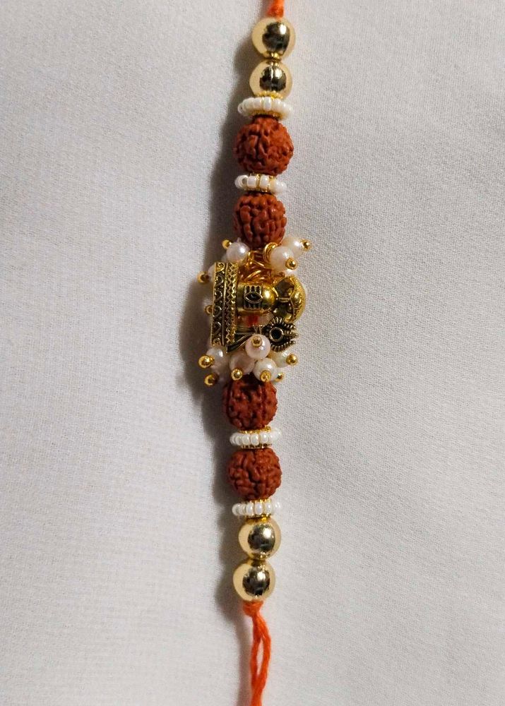 Elegant Rakhi with Trishul Charm