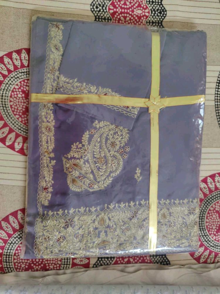 Beautifully Embroidered Saree with blouse piece