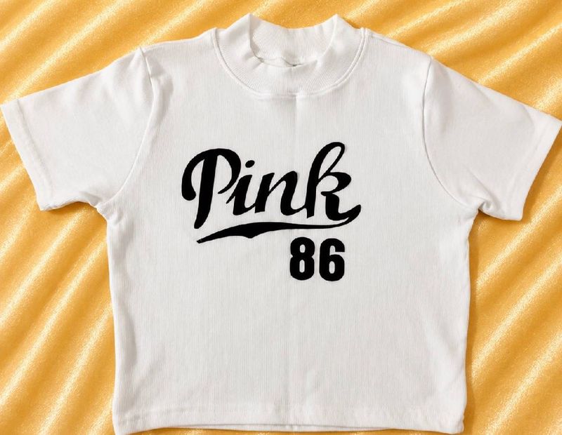 white graphic crop top
