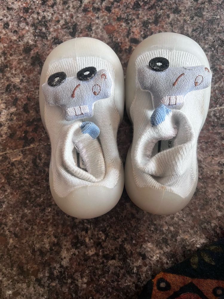 2 pair of kids shoes