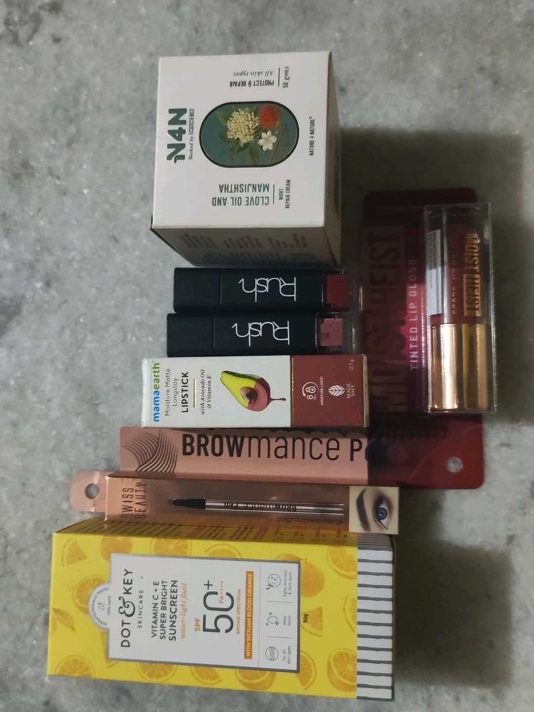 DK sunscreen , mamaearth lipstick, swiss beauty ey