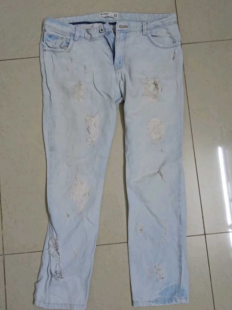Light Wash Ripped Jeans