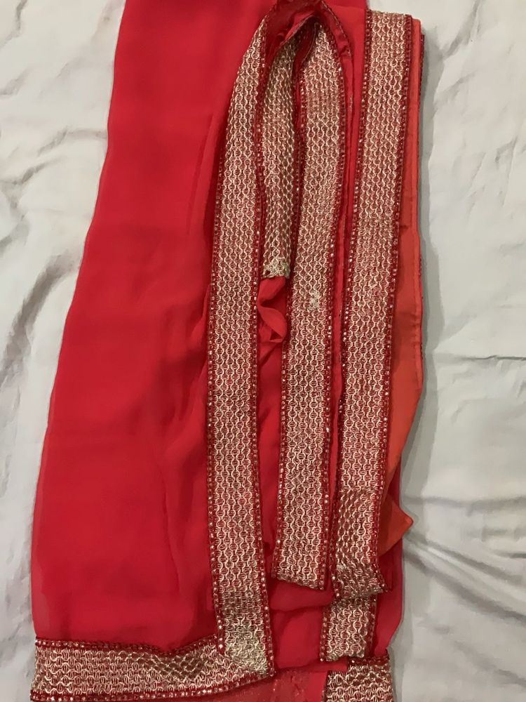 Elegant Red Saree with Embellished Border