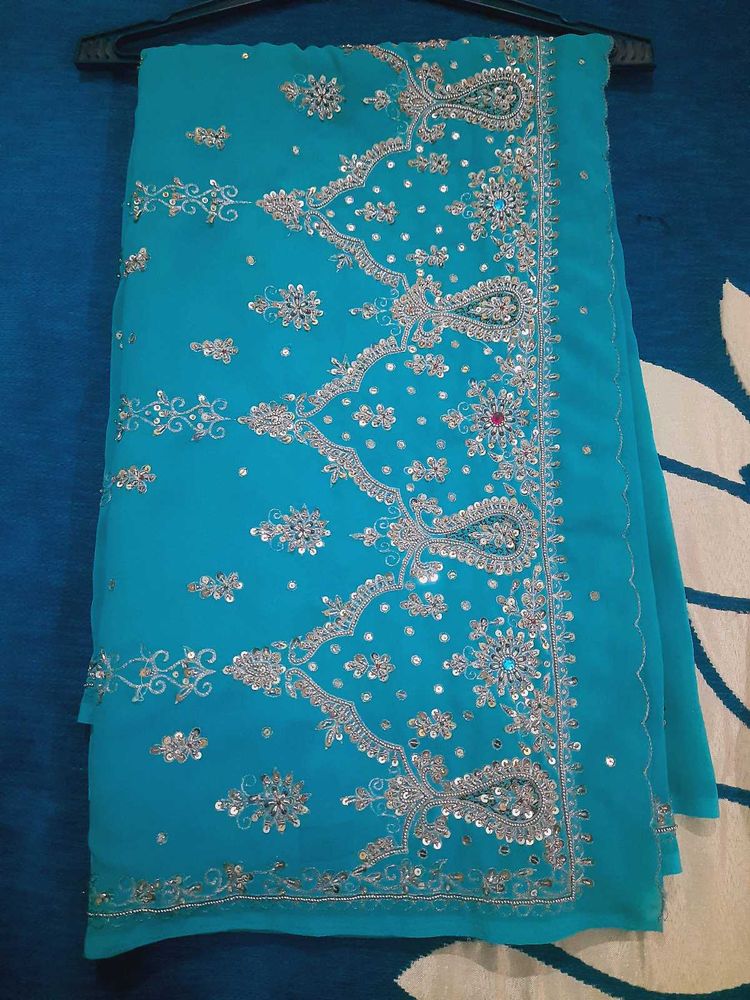 Elegant Turquoise Embroidered Saree