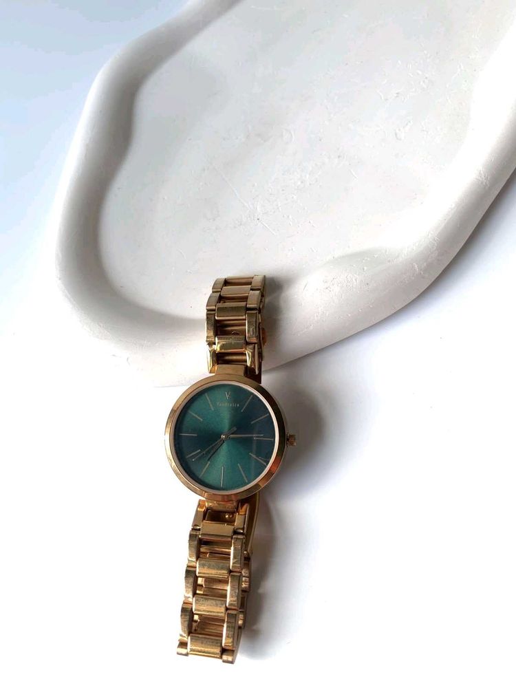 Elegant Gold Watch with Green Dial