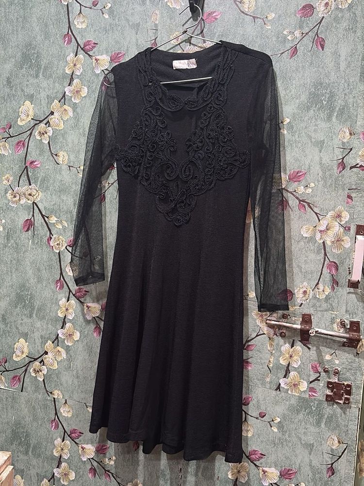 Elegant Black Dress with Lace Detail