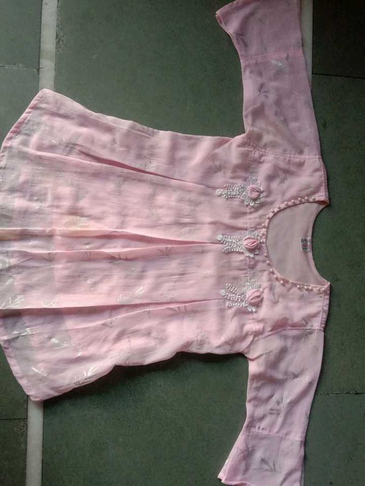 Cute pink colored top