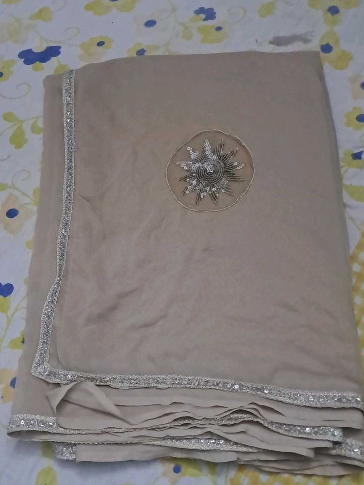 Elegant Beige Saree with Embellishment