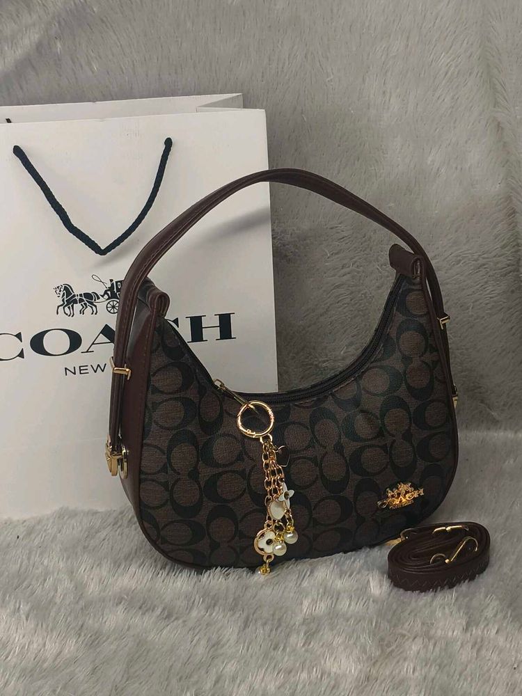 Coach Moon coffee brown with charm 🤎