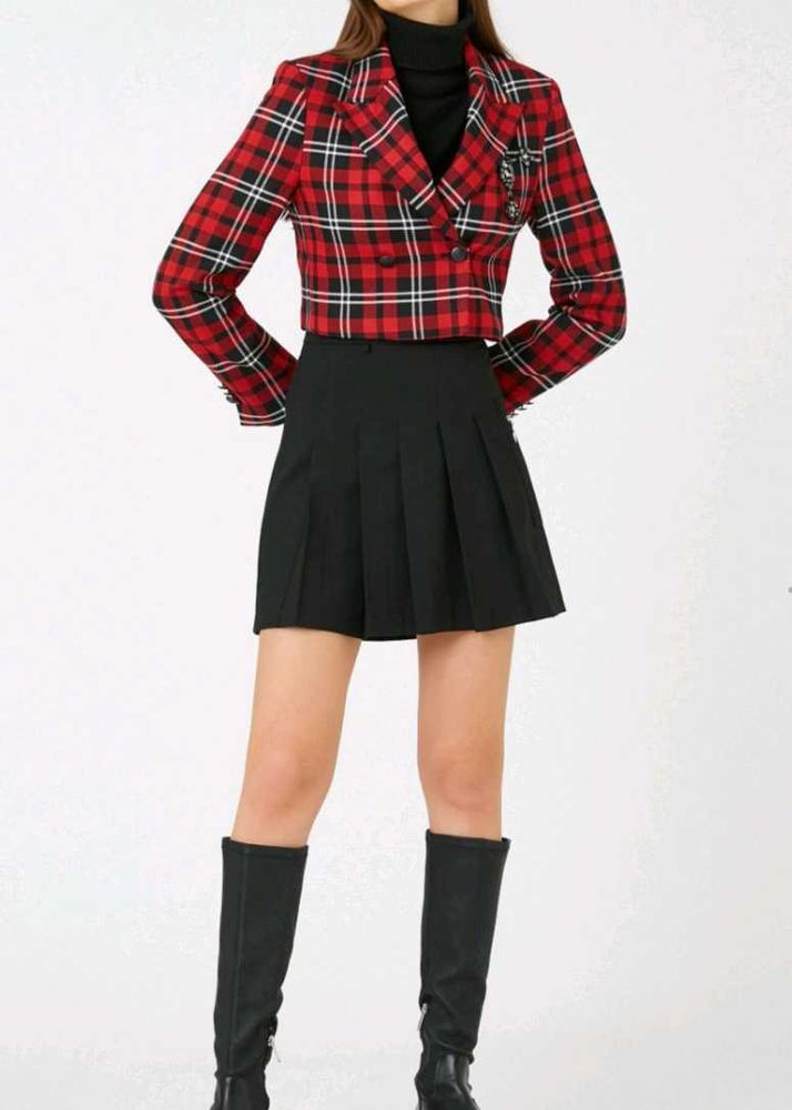 Classic black pleated mini skirt.