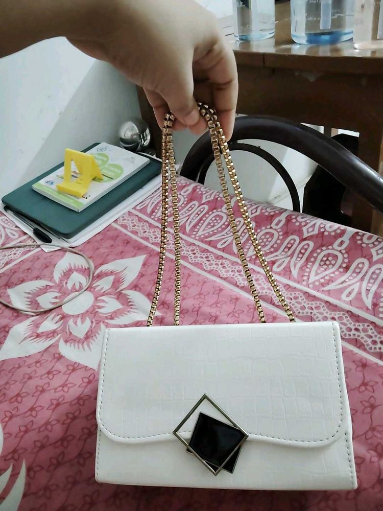 26.Chic White Clutch with Gold Chain