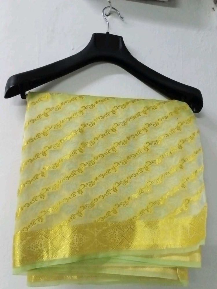 Elegant Yellow Saree with Golden Border