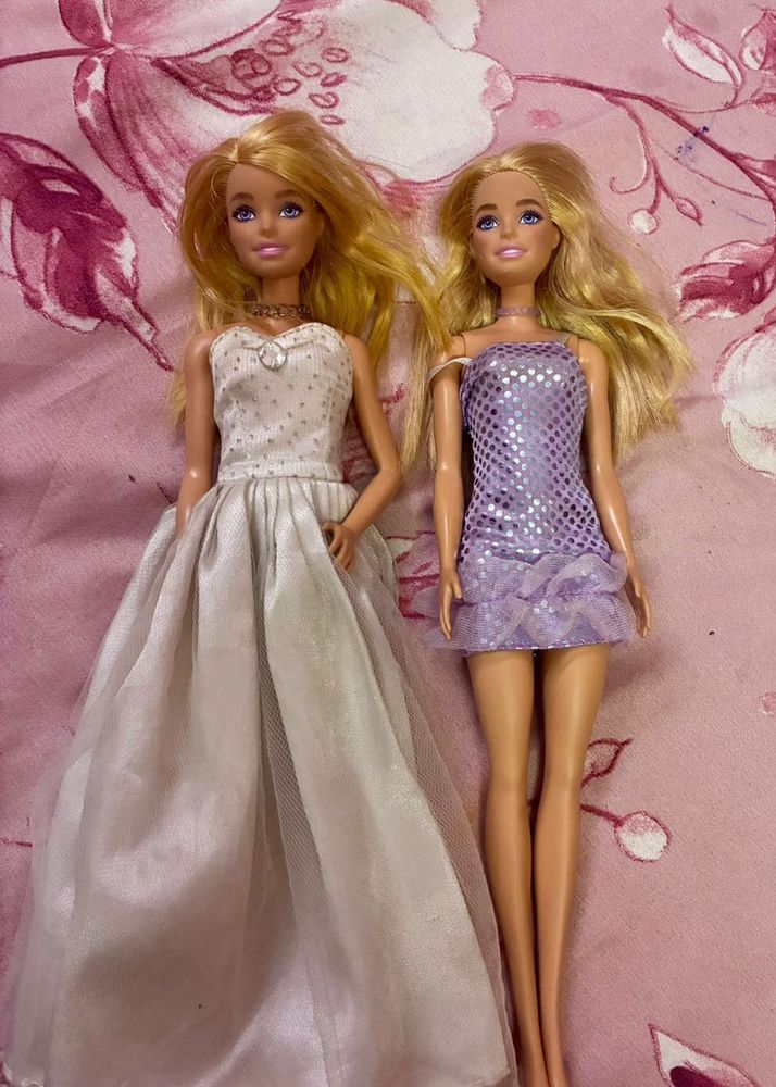 (Authentic)Two Barbie Dolls With Outfits