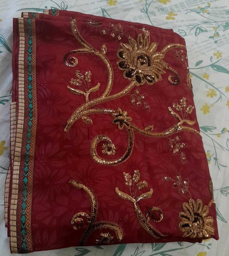 Elegant Maroon Embroidered Saree