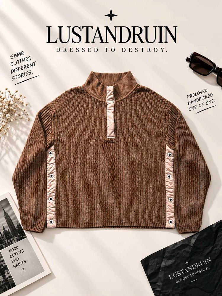 RIBBED KNIT SWEATER.