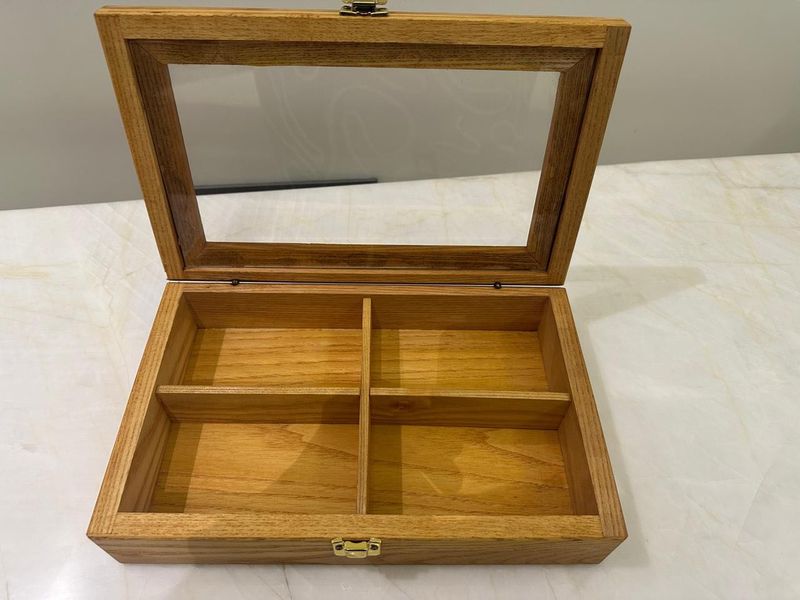 Woodenstorage box with glass lid