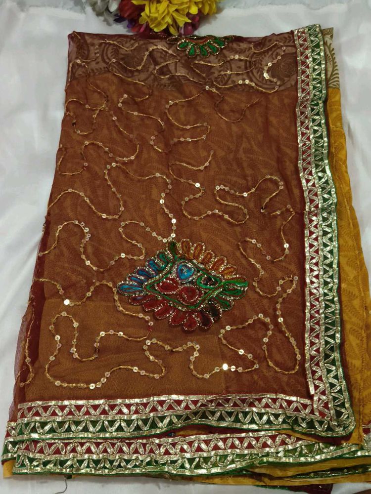 Embellished Brown Net Saree with blouse