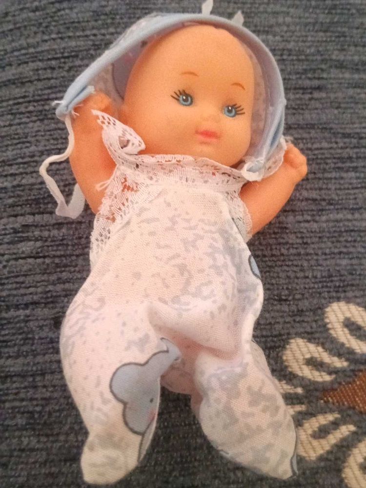 Cute Baby Doll with Bonnet