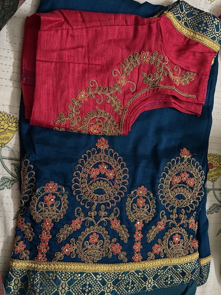 Embroidered Teal Saree with Pink Blouse