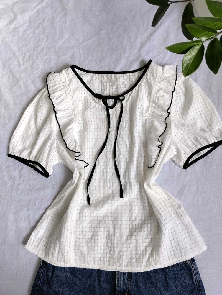 Chic White Puff Sleeve Top with Black Trim