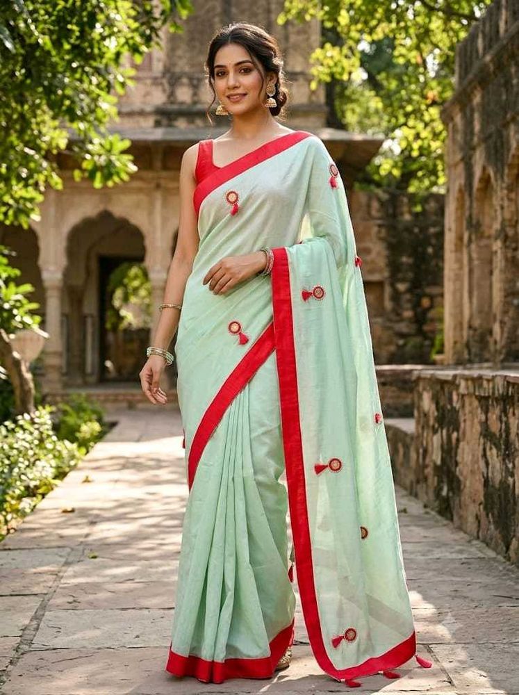 Elegant Light Green Saree with Red Border