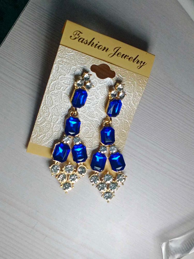 Elegant Blue and Clear Gemstone Earrings."
