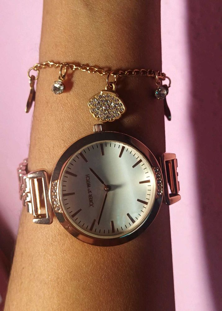 Elegant Rose Gold Watch with Charm Bracelet