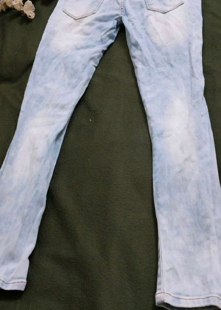 Light Wash Distressed Denim Jeans