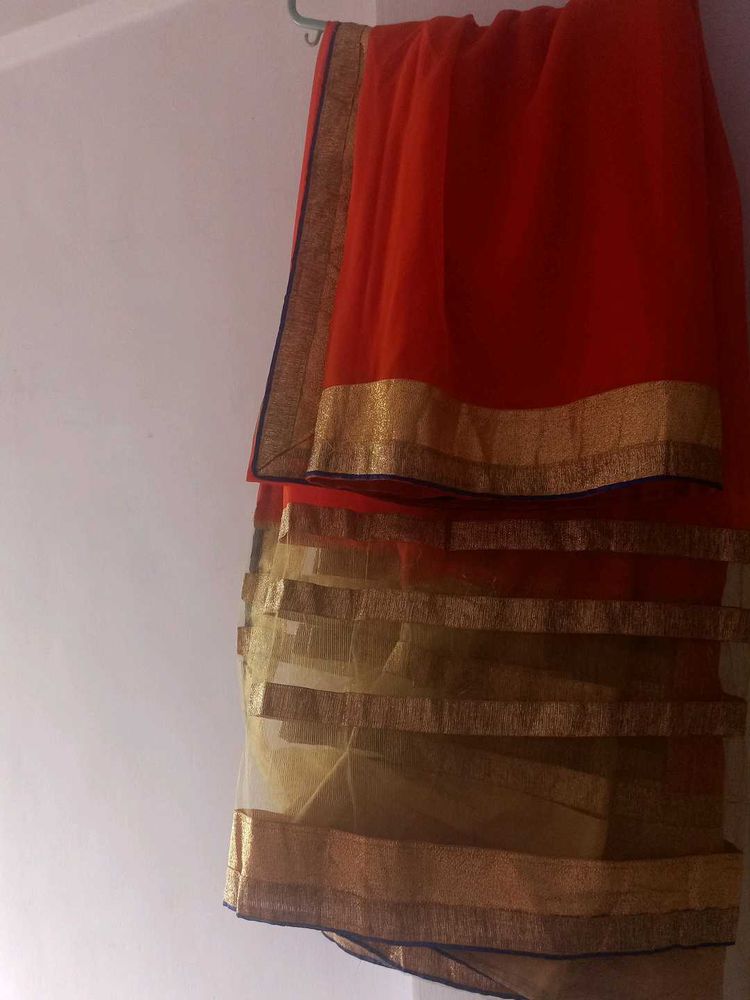 Elegant Orange Saree with Golden Border