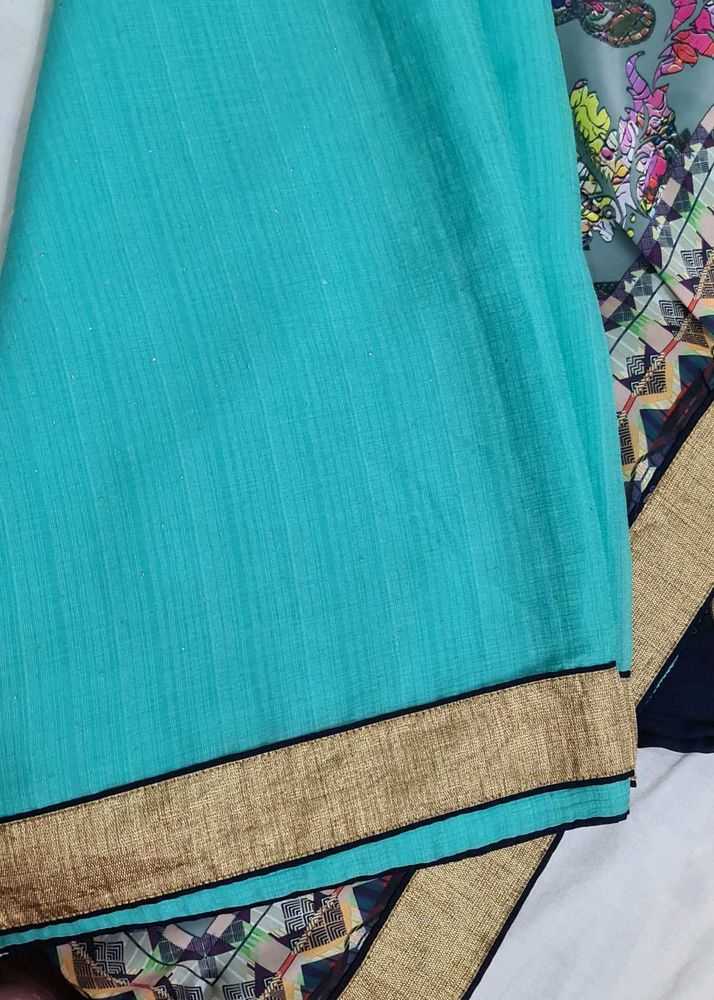 Beautiful Teal Saree with Gold Border