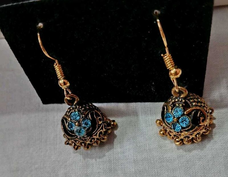 Gold Jhumka Earrings with Blue Stones