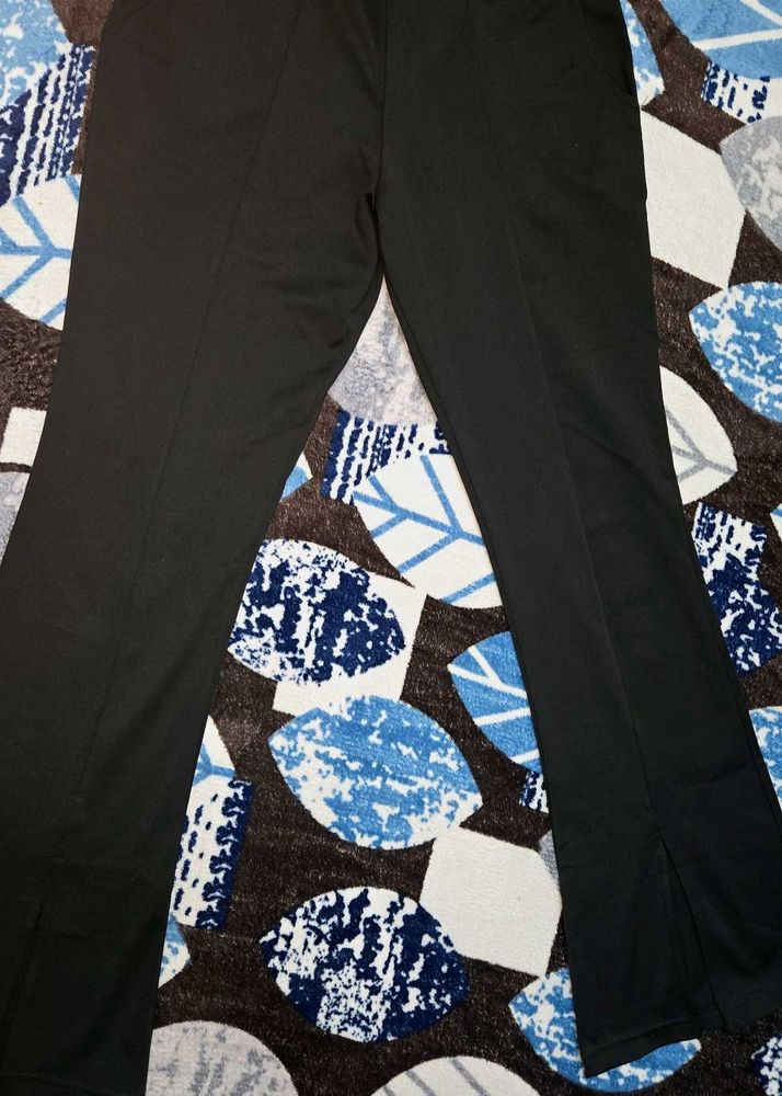 Black hem slit pants