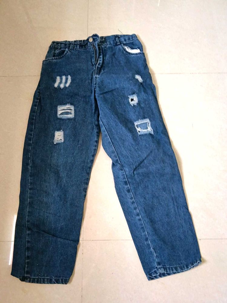 Distressed Blue Denim Jeans