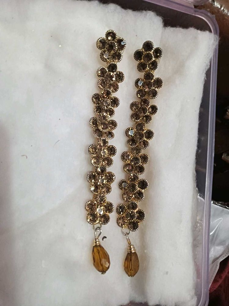 long gold earrings