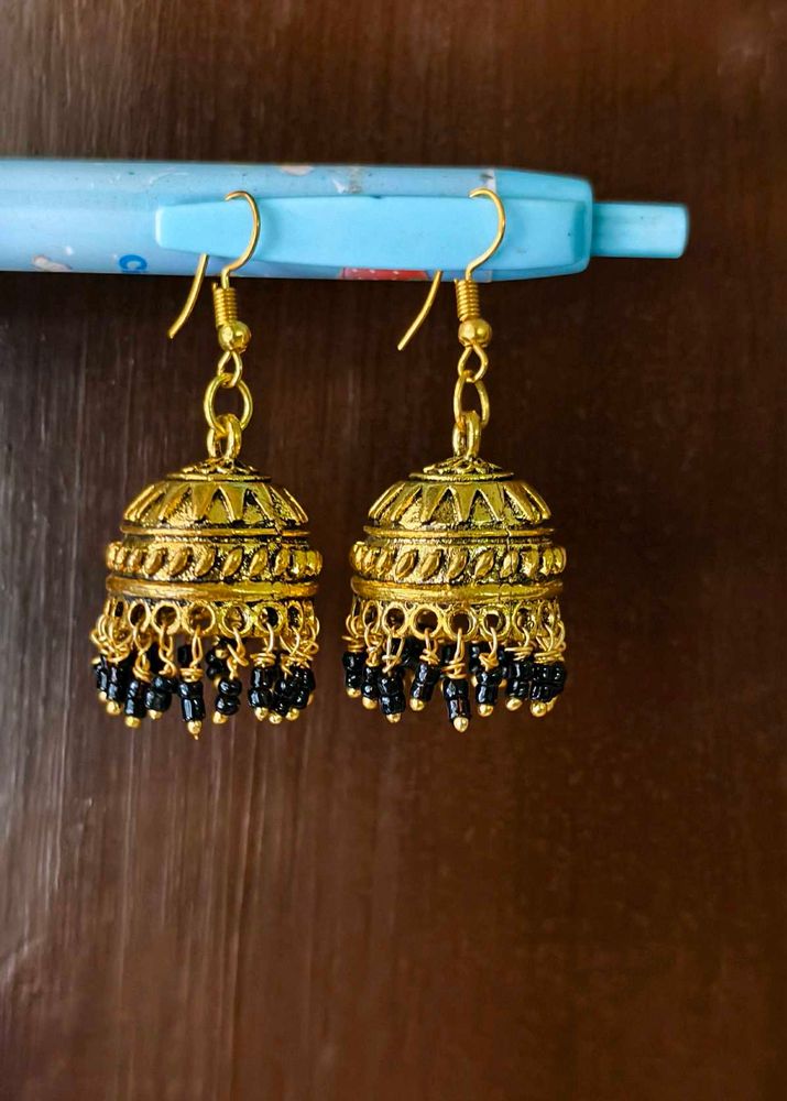 Elegant Gold Jhumka Earrings with Black Beads