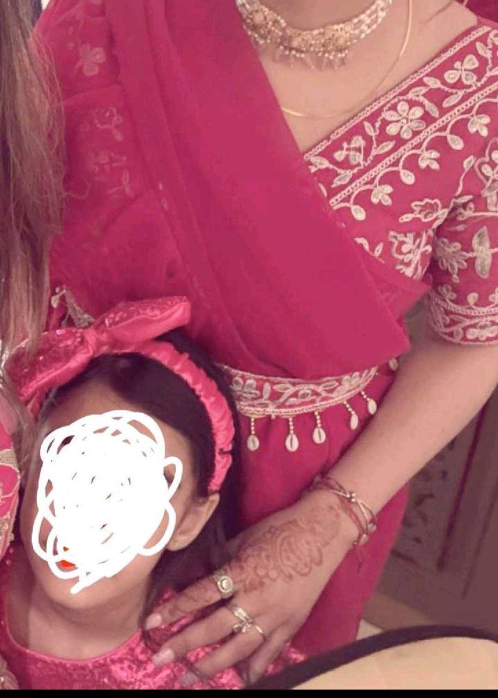 rani pink ruffle saree with belt