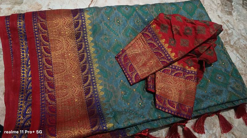 Exquisite Teal Saree with Red Blouse
