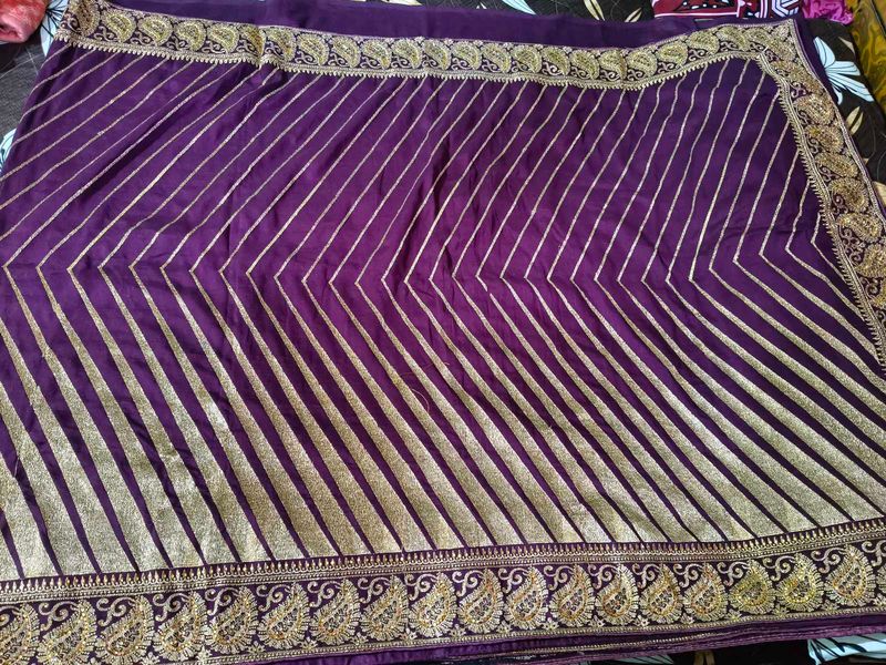 Elegant Purple Saree with Gold Stripes