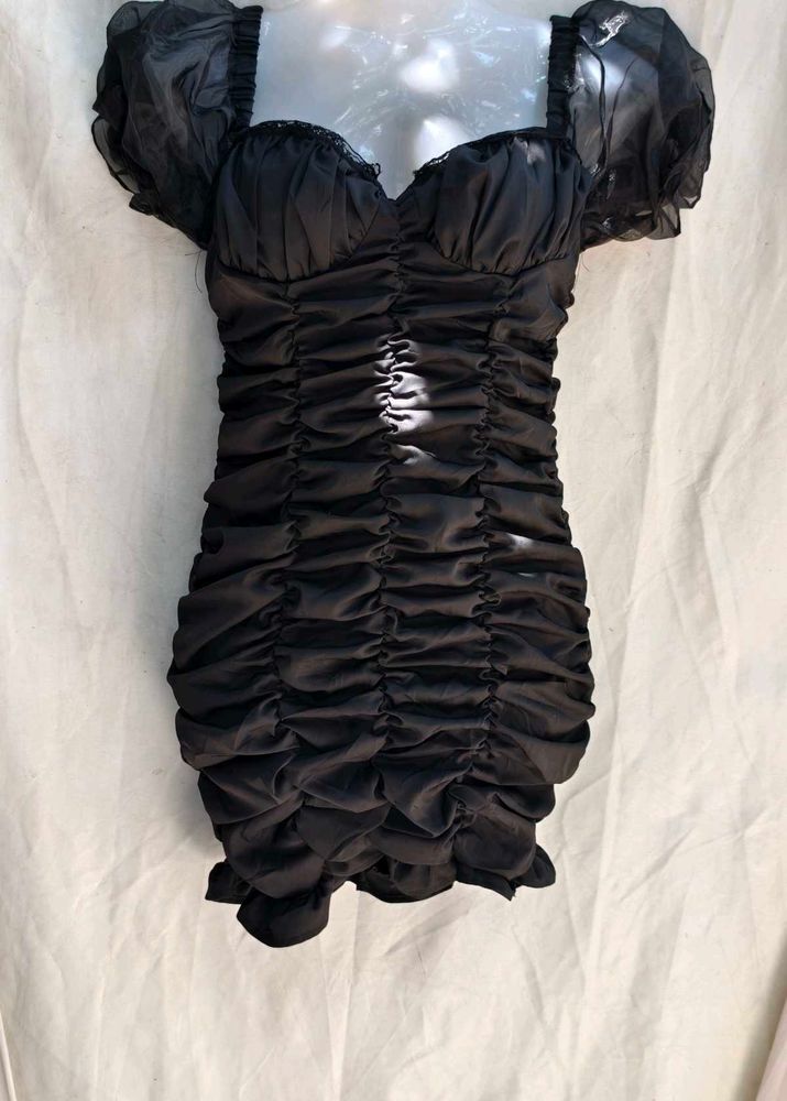 713. Chic Black Ruched Mini Dress